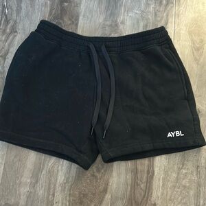 Aybl medium black athletic if wear shorts. Super soft lightweight fleece fabric.